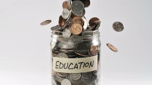 Education Fund Jar Filled with Coins