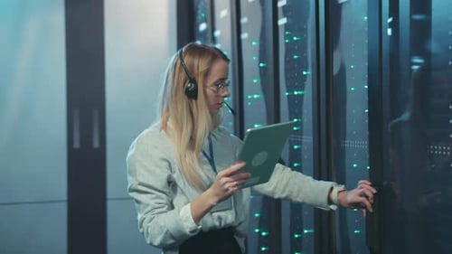 A Skilled Female IT Specialist Dedicated to Effectively Monitoring Various Data Center Operations