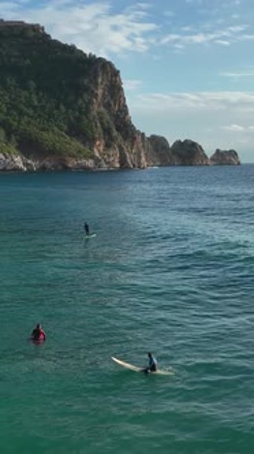 Vertical Video Mesmerizing Aerial Capture Thrilling Surfing Moments in Alanya Turkey