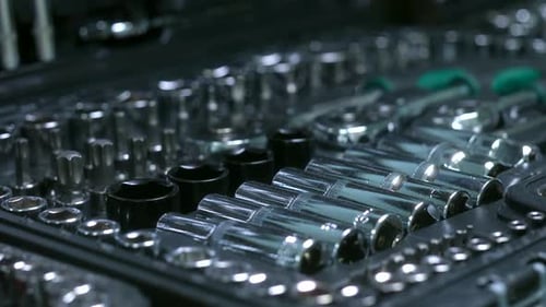 Chrome Sockets and Wrenches in Organized Toolbox