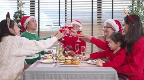 Family Christmas Celebration with Holiday Meal and Toast