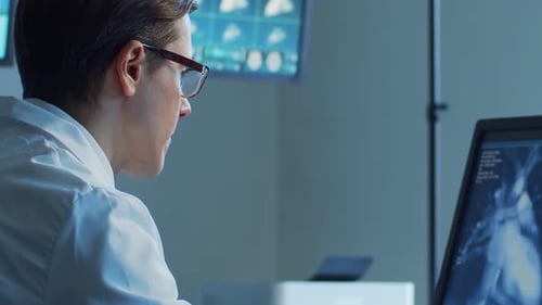 Professional Medical Doctors Working in Hospital Office Making Computer Research Medicine Healthcare