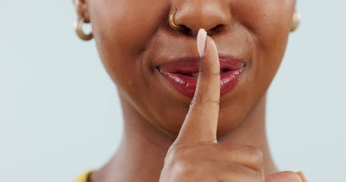 Secret, face and mouth of happy woman with finger on lips for sign of privacy