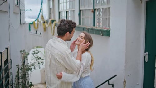 Happy Lovers Kissing Tenderly at Tiny Street Closeup Love Pair Romantic Date