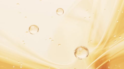 Golden Fluid Bubbles Abstract Flowing Background Animation