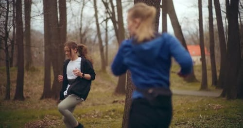 Two Woman Workout Exercising In Park Jogging Fitness