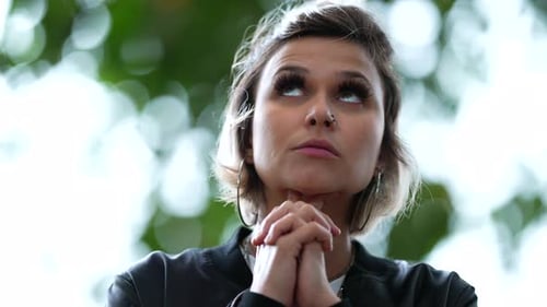 Woman sighs wondering about problems. Person sigh thinking about solution