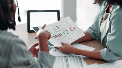 Business people, analytics or meeting with documents for statistics, data or overview at office