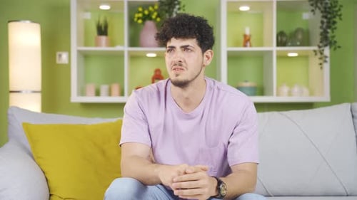 Crying young man.