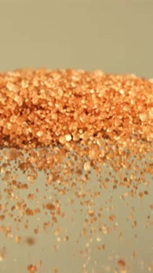 Cane Sugar Pours Out of a Spoon Filmed on a Highspeed Camera at 1000 Fps