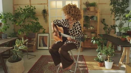 Girl Singing Song, Playing Acoustic Guitar at Home Garden