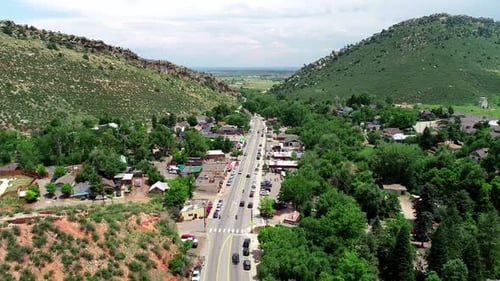 Drone View Road Through Mountain Town