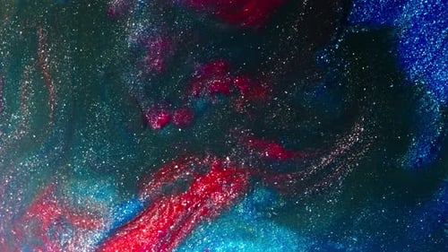 Vibrant colors swirling and blending in a mesmerizing shot of abstract fluid art