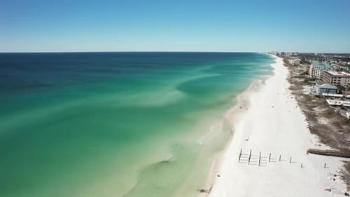Astounding Aerial Shot Of Aqua Blue Water Of Beach In 30A Florida, United States. wide