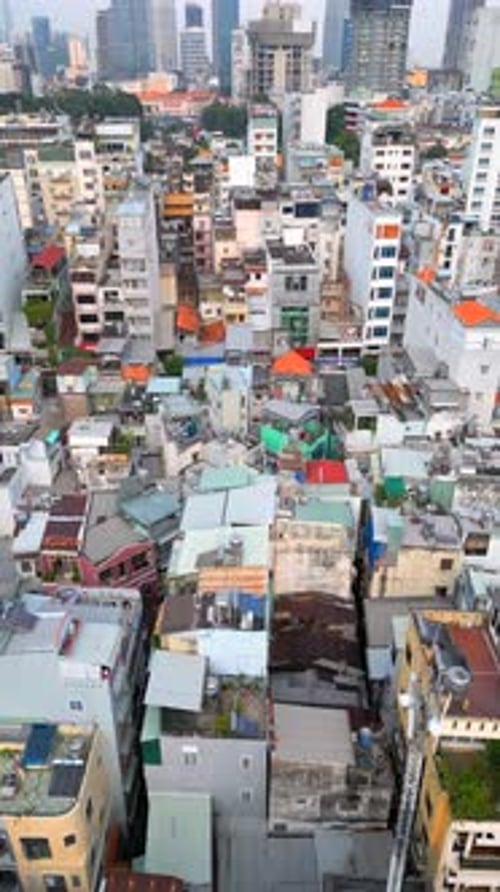 Aerial of Ho Chi Minh City Skyline with Dense Housing and Modern Skyscrapers
