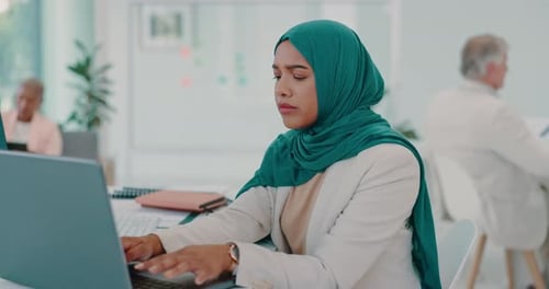 Muslim, business woman and typing on computer in office, startup company and digital management