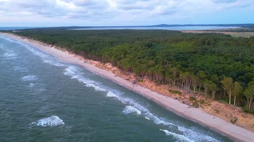 Dramatic sea sunset. Burning sky and shining golden waves. Sunset sea 4k. Red sky, yellow sun and am