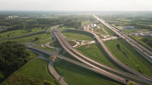 Cars Moving on Transport Road Junction in City Aerial View
