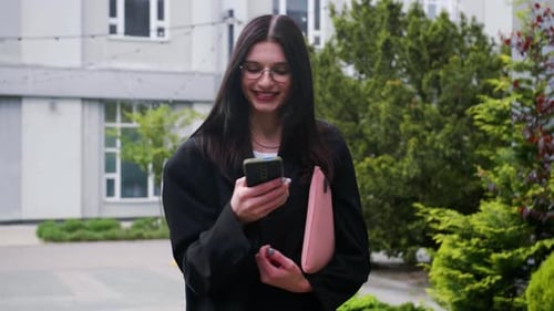 Close Up of Caucasian Businesswoman Using Smartphone on Street in a Big City Confident Female