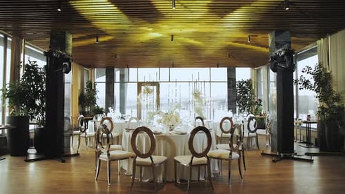 Wedding Reception Venue With Elegant Table and Chairs