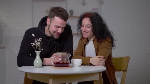 Smiling Loving Woman Talking with Man Enjoying Date in Cafe in Urban City Portrait of Cheerful Happy