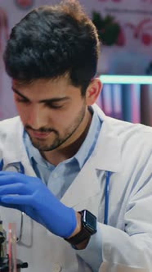 Close Up Portrait of Goodlooking Responsible Highskilled 30Aged Bearded Chemist Scientist in White