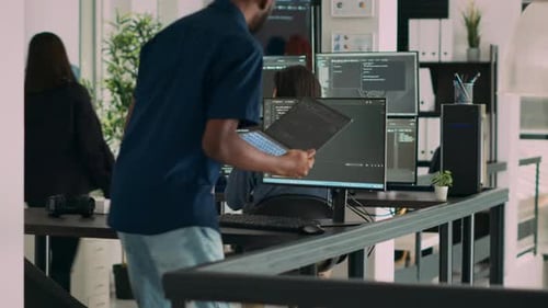 Database Programer Working on Html Script Code to Develop Program App Server