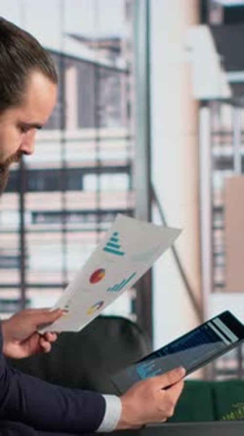 Vertical Video Documents Analysis Businessman Reviews Company Metrics KPIs and Reports