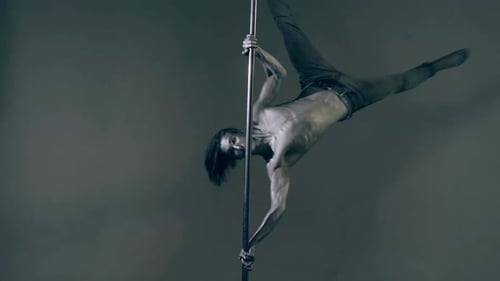Flexible Sexy Body of Young Man Pole Dance Sexy Man Exercise Pole Dance Fit Slim Sexy Man Performs