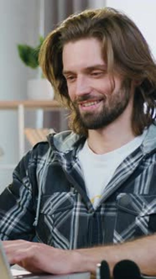 Distant Work Concept Where Attractive Man Worker Sitting at His Workplace in Cozy Home Office and