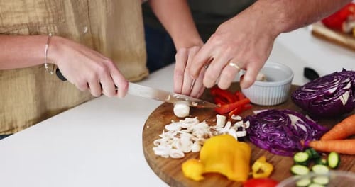 Woman Prepares Meal with Fresh Vegetables in Kitchen