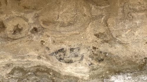 Images of European sailing ships in ancient maori rock art drawn in caves and rock overhangs near to