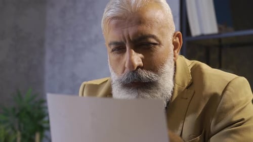 Office worker reviewing documents.
