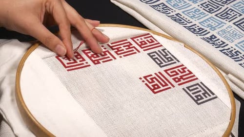 Close Up Hand Embroidery on White Fabric