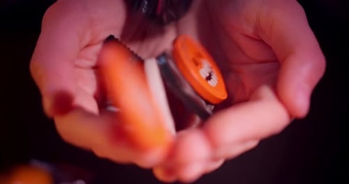 Hands Holding Packaged Halloween Candy