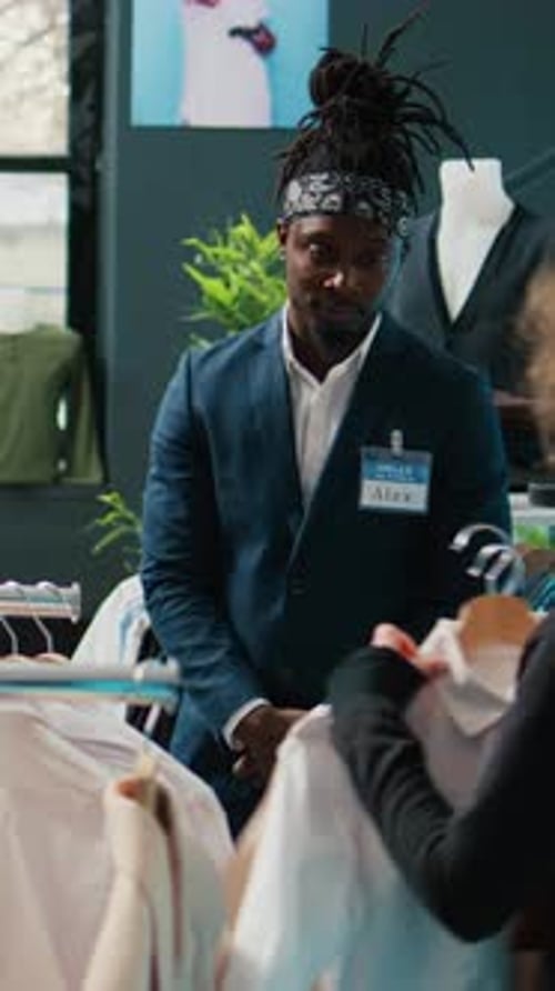 Vertical Video Clothing Store Employee Makes Fashion Recommendations for Client