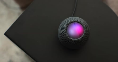 Smart Home Speaker with Shifting Colors on Table