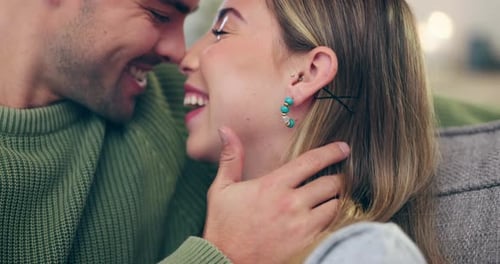 Happy Couple Laughing Closely Indoors