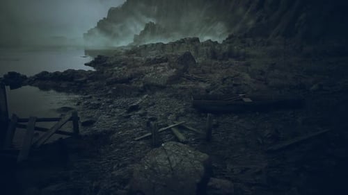 Fog Engulfs Rocky Shoreline with Scattered Debris at Twilight