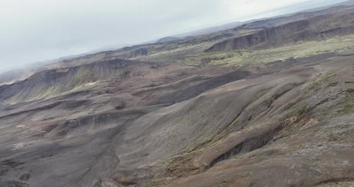A mesmerizing dance of fire and smoke is revealed in drone footage of Volcano Fagradalsfjall's rim,