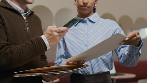 Man Taking Shot of Documents