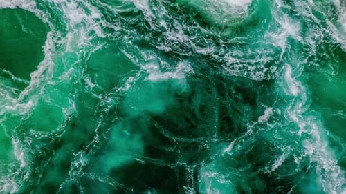 Waves of water of the river and the sea meet each other during high tide and low tide.