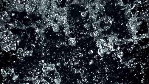 Dramatic Water Droplets Suspended in Air on Black Background