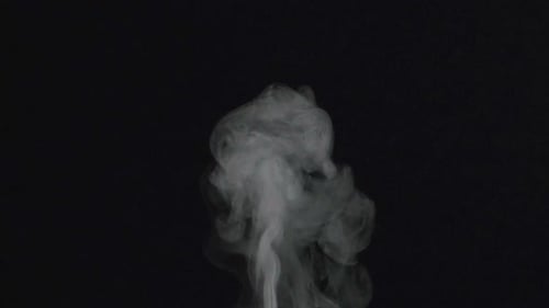 Gentle Smoke Rising on a Black Background