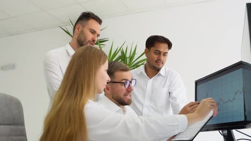 A Team of Diverse Traders Investors Analyzes the Stock Market or Cryptocurrency