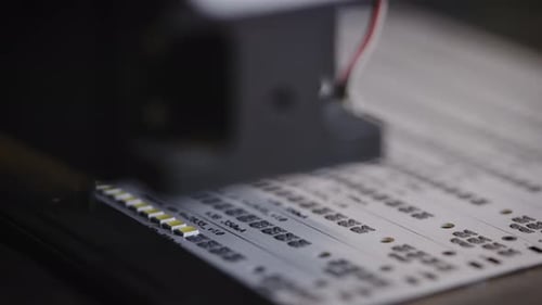 Automated Machine Installs Microchips on Electrical Boards