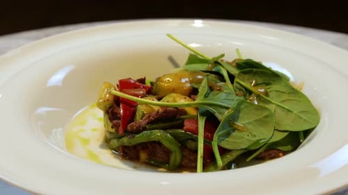 Plated Salad with Peppers and Spinach Rotating