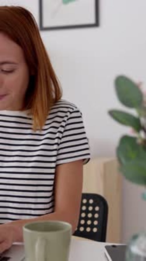 Young Freelancer Woman Using Laptop Working at Home Office