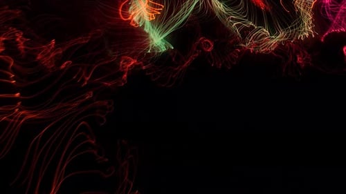 Fluorescent particles move in the liquid stream in slow motion.