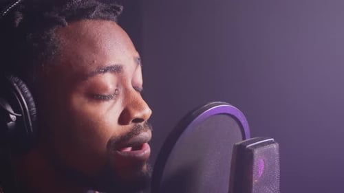 Talented African American Singer is Singing New Song in Audio Record Studio Closeup Portrait